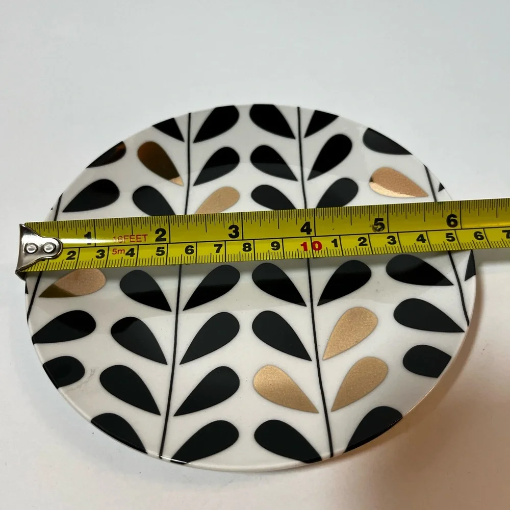 Macy’s Designer plates - set of 4